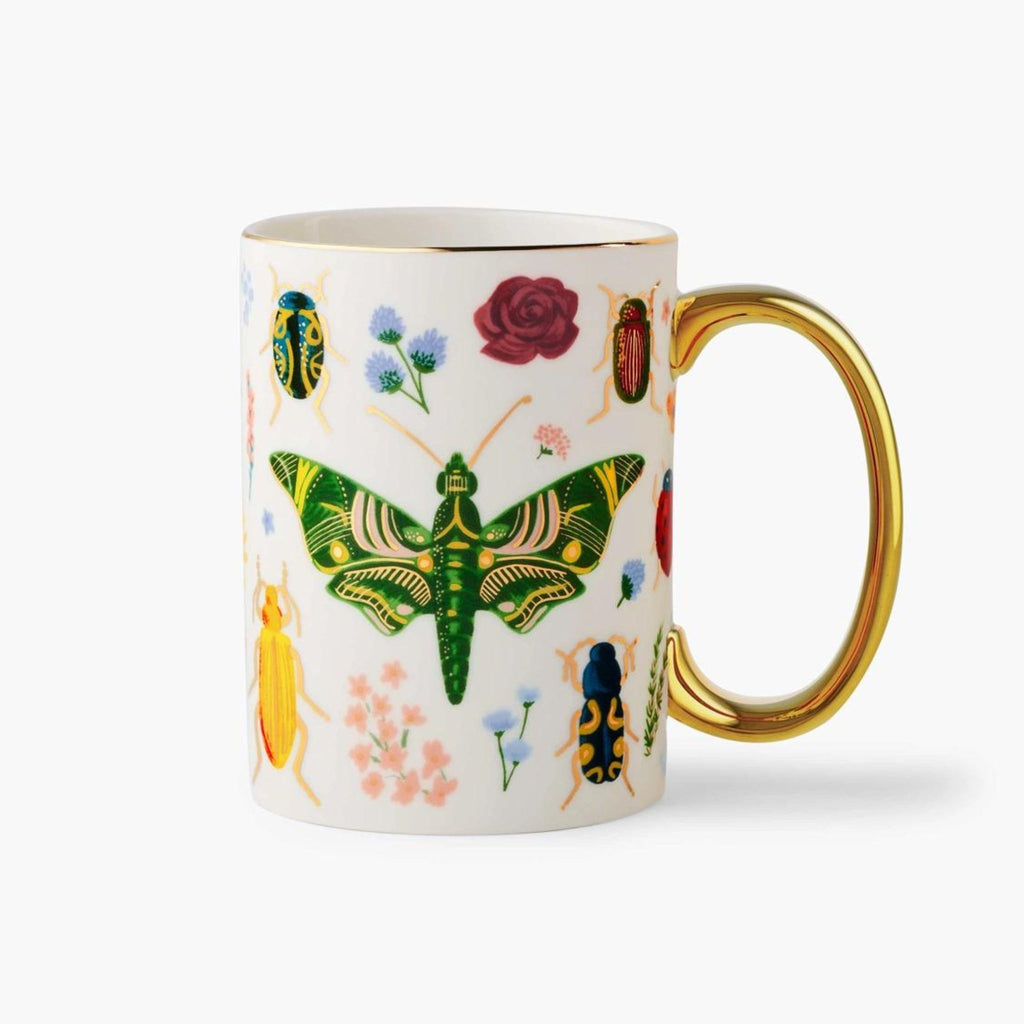 curio nature inspired porcelain mug with gold accents 