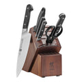 wooden knife block with chef's knife pulled out 